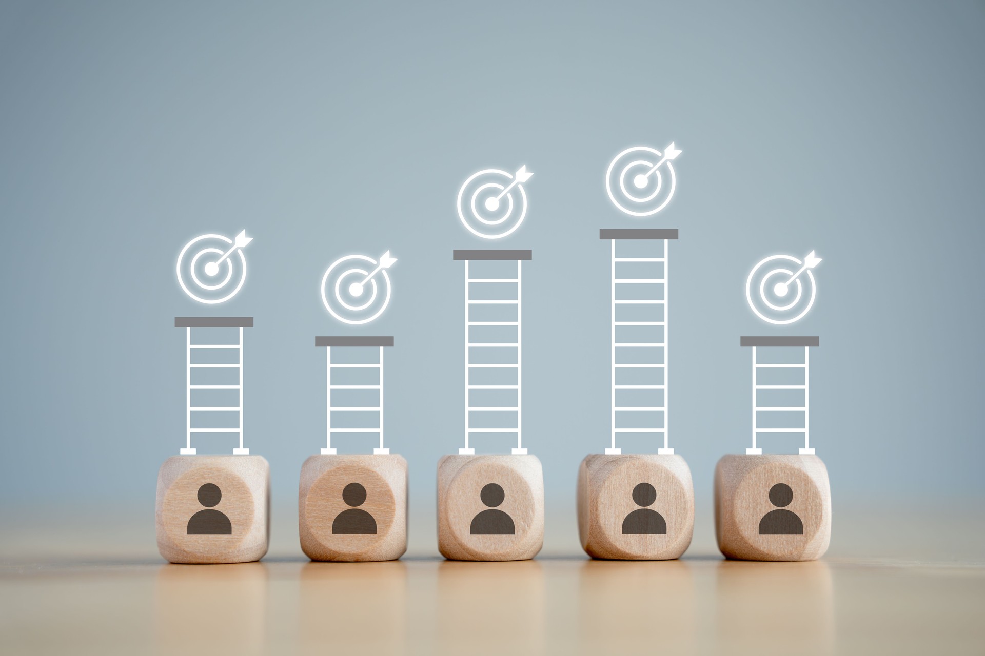 Success concept. Human with difference target. Wooden blocks with human icon and difference hight of stairs to target